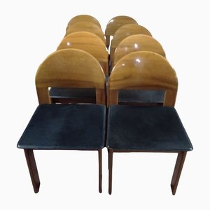 Sillas para sala de reuniones modelo Incanto de nogal nacional con asientos búlgaros de cuero de Parma. Juego de 9