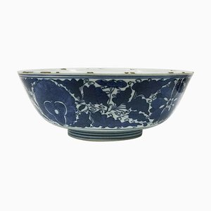Cuenco chino Kangxi de porcelana azul y blanca decorado con loto