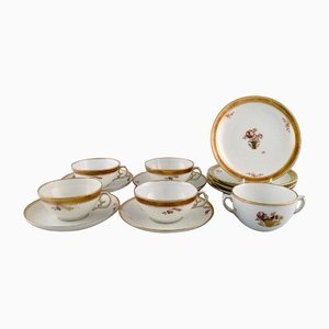 Servicio de té en forma de cesta dorada para cuatro personas de Royal Copenhagen. Juego de 13