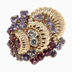 Roségold Cluster-Ring mit Granaten Ioliote und Diamanten