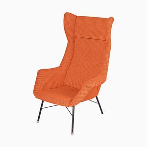 Sillón checo Mid-Century moderno en naranja de Miroslav Navratil, años 60