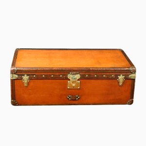 Baúl de viaje en naranja de Louis Vuitton, años 30