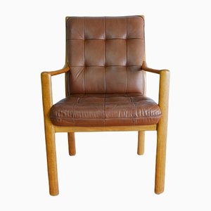 Lounge Chair in Oak and Cognac Leather by Helmut Lübke, 1970s