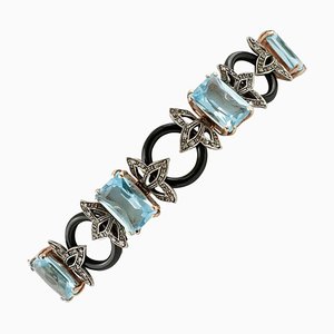 9K Rose Gold and Silver Link Bracelet with Diamonds and Topaz