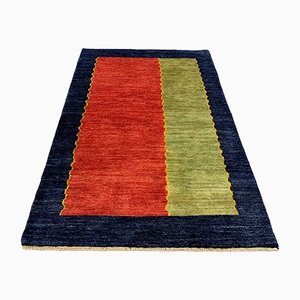 Alfombra vintage en azul y rojo tejida a mano de Zollanvari