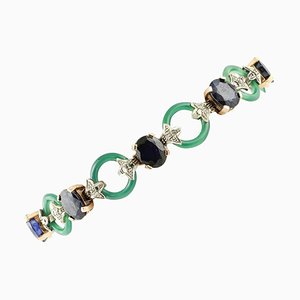 Bracelet en Or Rose et Argent avec Diamants et Saphirs Bleus