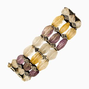 Brazalete de oro rosa y plata de 9 quilates con diamantes y piedras