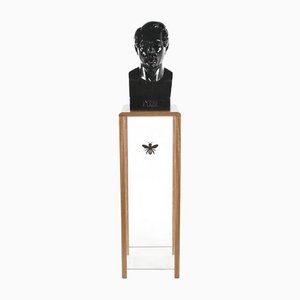 Busto de Napoleón III sobre asiento de madera y vidrio