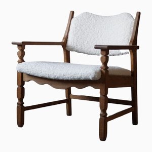 Danish Modern Razorblade Lounge Chair in Oak and Bouclé by Henning Kjærnulf, 1950s