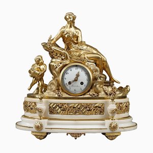 Reloj de bronce dorado con Venus y Cupido, estilo Luis XVI