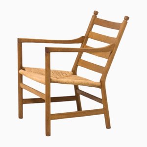 CH44 Lounge Chair in Oak and Papercord by Hans Wegner for Carl Hansen & Søn