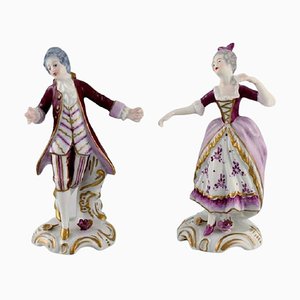 Figuras alemanas antiguas de porcelana de una pareja rococó. Juego de 2