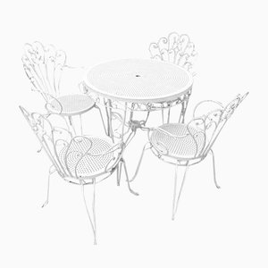 Mesa y sillas de jardín vintage de hierro blanco. Juego de 5