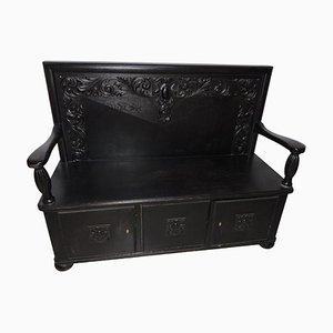 Antique Black Bench with Carvings and Storage