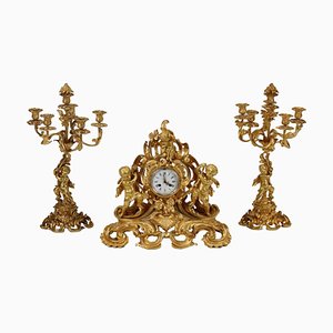 Reloj tríptico de bronce de G. Raglia