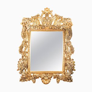 Espejo decorativo florentino de madera dorada