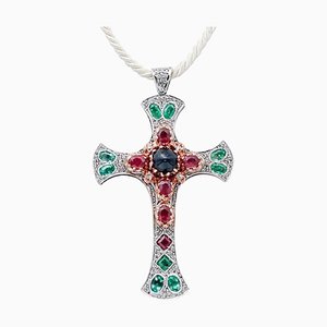 Collier pendentif croix en or rose et argent avec saphir, émeraudes, rubis et diamants