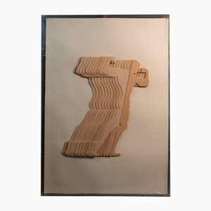 Pannello scultoreo in legno di Mario Ceroli