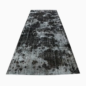 Schwarzer Vintage Teppich