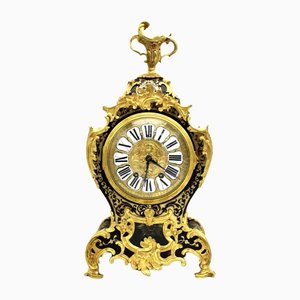 Reloj de péndulo Cartel de bronce dorado y latón del siglo XIX