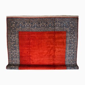 Tappeto Sarough floreale rosso chiaro con bordo