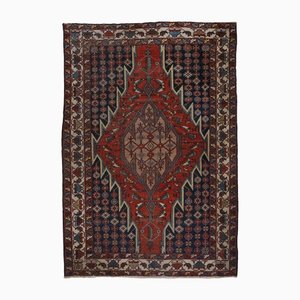 Geometric Tafresh Rug in Light Red with Border and Medallion