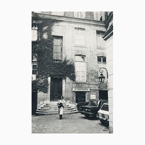 Jacky Onassis in Front of a House, 1950s, Black and White Photograph