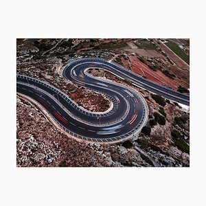 Felix Cesare, A Long Exhibition of Vehicules Movement with Bluring and Light-Trails on a Winding Road Pendant the Night, Papier Photographique