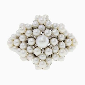 Brazalete en oro blanco con perlas y diamante
