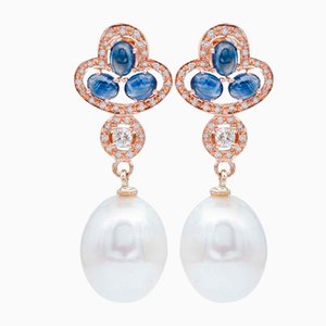 Aretes colgantes en oro rosa de 14 quilates con diamantes y perlas de zafiros azules