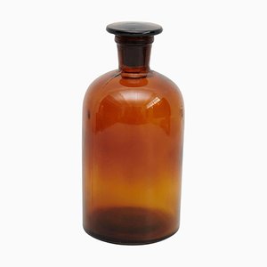 Antike bernsteinfarbene Apothekerflasche aus Glas mit Deckel