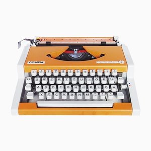 Máquina de escribir portátil De Luxe de Olympia, años 70