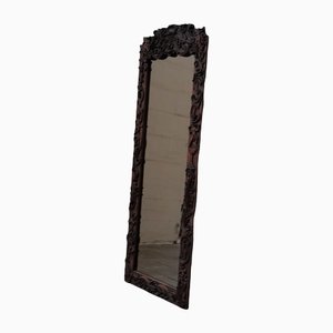 Antiker Spiegel mit geschnitztem Holzrahmen