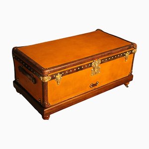 Baúl de viaje naranja de Louis Vuitton