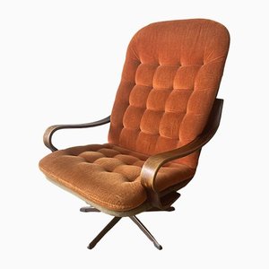 Vintage Danish Orange Swivel Armchair