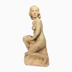 Escultura de mujer desnuda, años 50