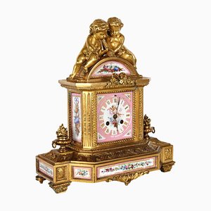 Reloj de mesa de porcelana, siglo XIX