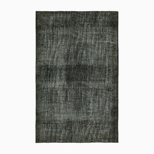 Alfombra de lana sobreteñida en negro