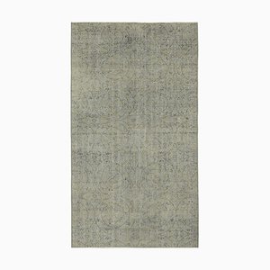 Tappeto vintage sovratinto grigio