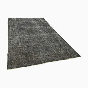 Alfombra vintage sobreteñida en gris