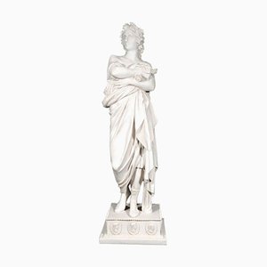 Figura de senador romano de mármol compuesto, siglo XX