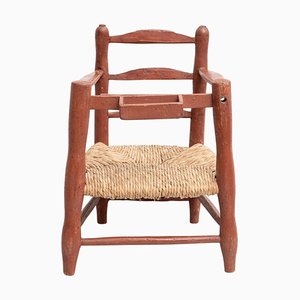 Silla infantil de madera y ratán, años 60