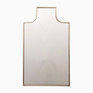 Espejo de pared vintage en forma de escudo con marco de latón, Italia