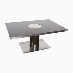 Mesa de comedor con superficie de formica lacada en negro brillante y base giratoria de disco de acero, años 70