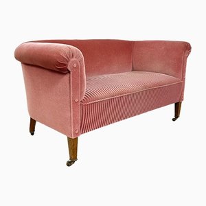 Sofá de dos plazas vintage de terciopelo rosa