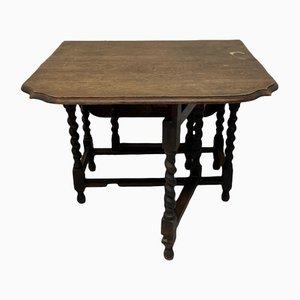 Mesa de golpeador antigua de madera