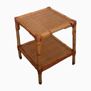 Mesa con ruedas y dos estantes de ratán y bambú, años 70
