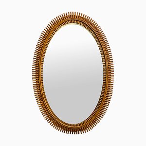 Rattan Oval Wall Mirror in the style of Olaf Von Bohr, Italy, 1960s