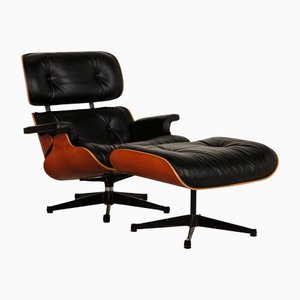 Leather Lounge Armchair with Footrest by Charles & Ray Eames for Vitra, Set of 2