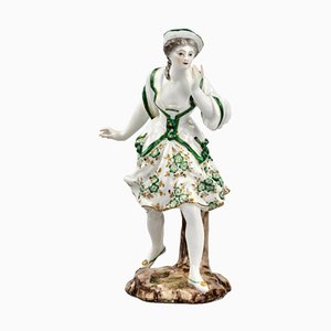 Figura francesa de porcelana que representa a una dama en verde, siglo XIX